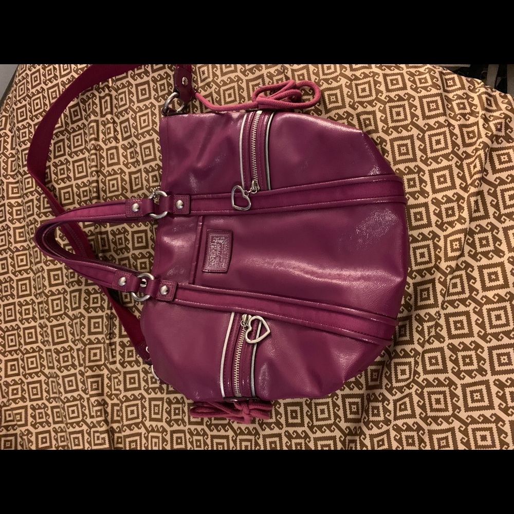 Purple leather coach purse